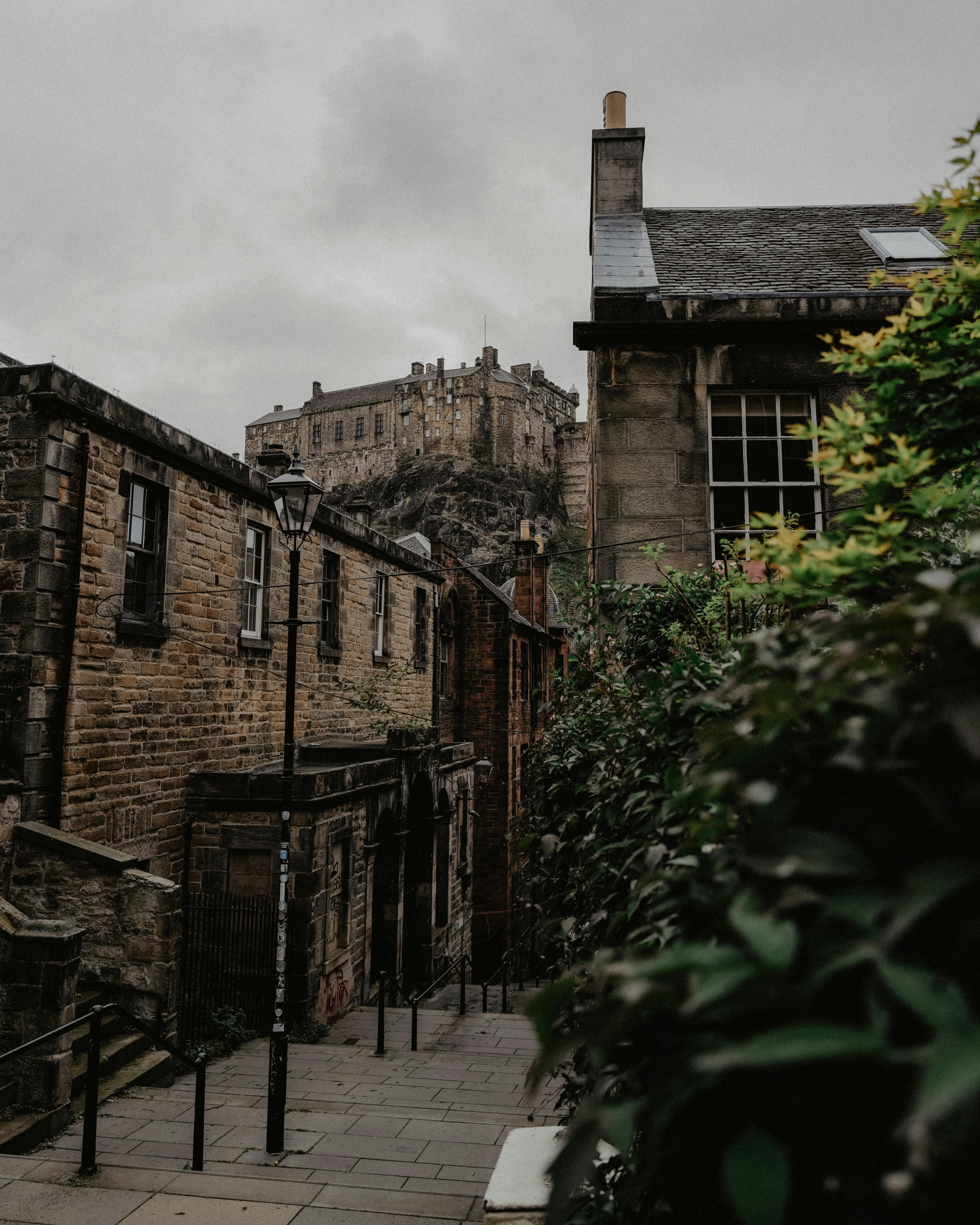 Historic cityscape with castles and cobbled streets